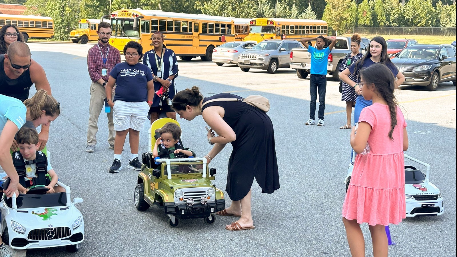 East Cobb Middle School club donates modified cars for students in need.
